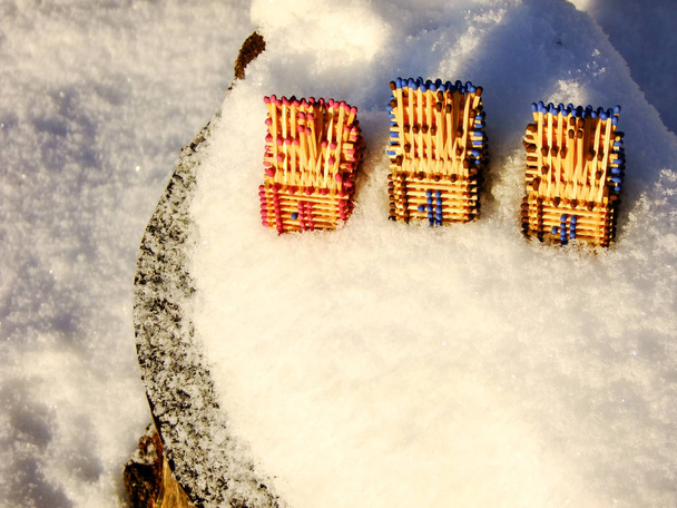 Houses of Matches standing on Snowy Mountain - Photo, Image