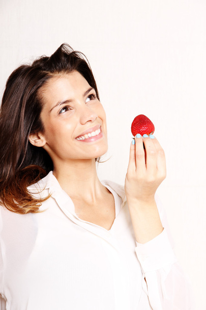 Eating a Strawberry - Foto, Imagen