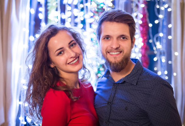 Beautiful hipster couple celebrating New Years Eve together. - Valokuva, kuva