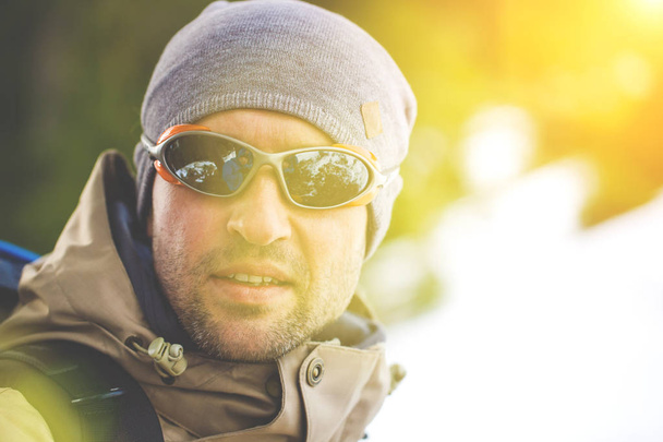 Portrait of climber in the glasses. - Photo, Image