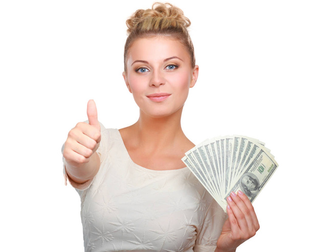 Mujer joven con billetes de dólar en la mano. Aislado sobre fondo blanco
 - Foto, imagen