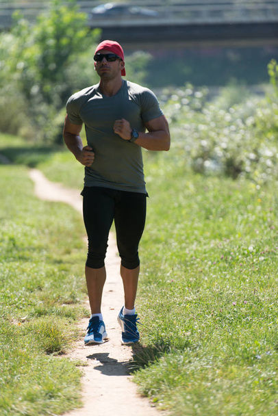 Male Runner Running City Park - Valokuva, kuva