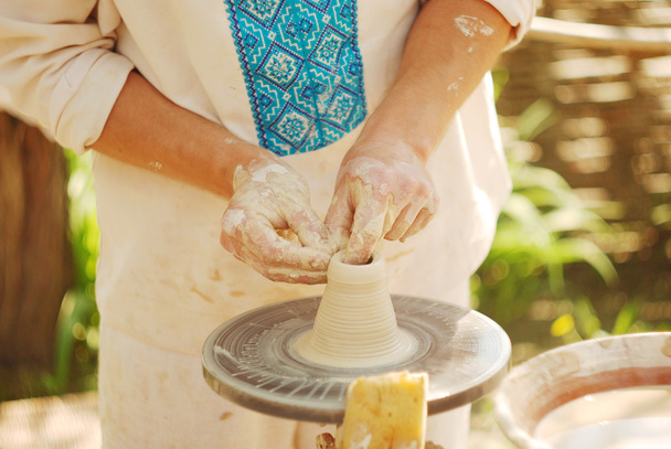 The process of making a vase on the potter's wheel - Photo, Image