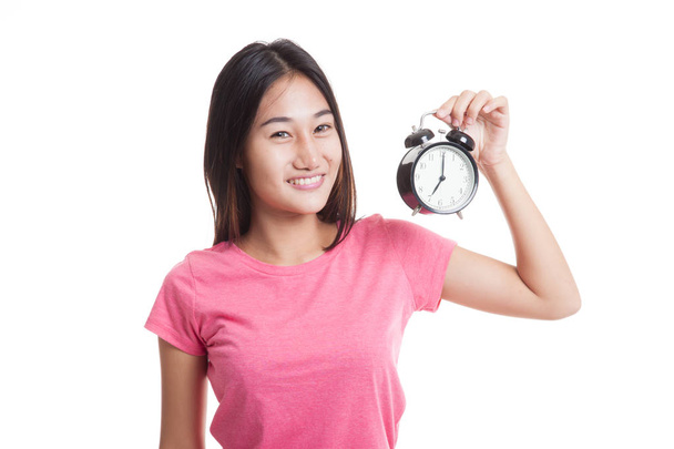 Young Asian woman with a clock. - Fotografie, Obrázek