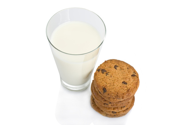 Chocolate chip cookies and a glass of milk isolated on white - Photo, Image