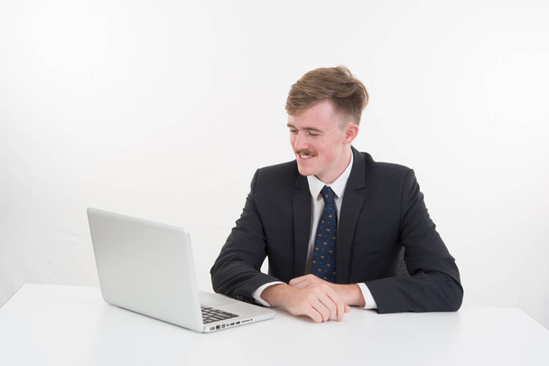 a business man with computer on white background - Photo, image