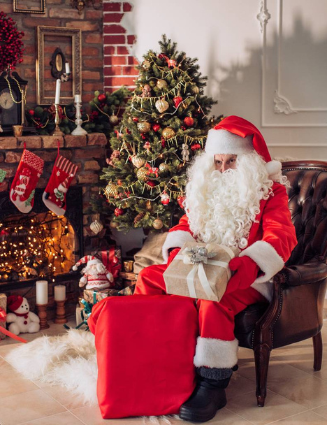 Santa Claus with gifts for Christmas - Φωτογραφία, εικόνα