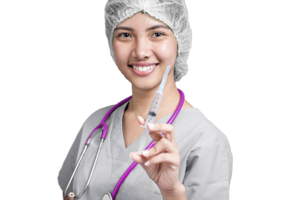 Enfermera con jeringa
 - Foto, Imagen