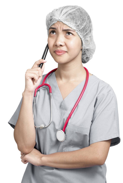 denkende Krankenschwester  - Foto, Bild