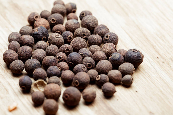 grains of black pepper  - Fotó, kép