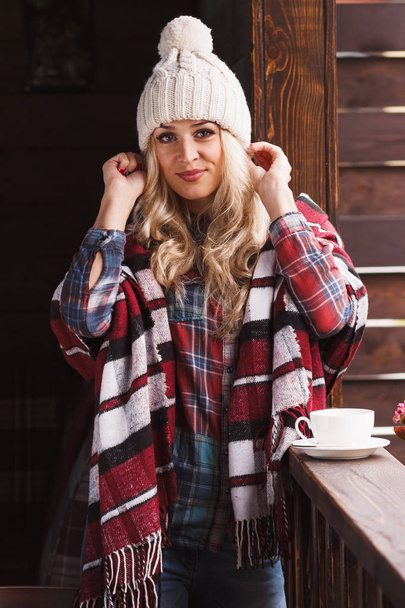 Young attractive woman in the plaid shirt - Photo, image
