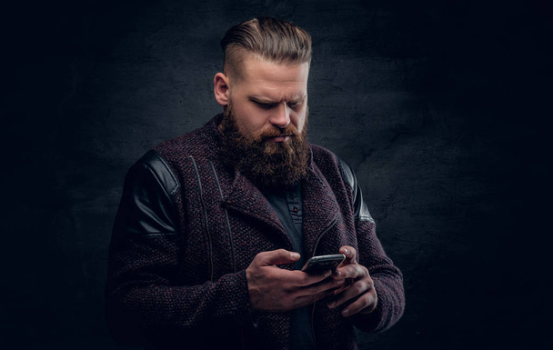 Brutal bearded hipster texting SMS - Photo, Image