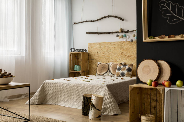 Bedroom with wooden accessories - Foto, imagen