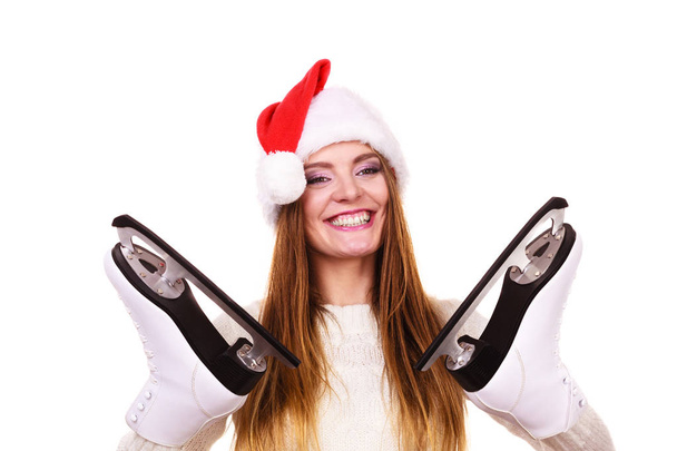 woman santa claus with ice skates - Foto, immagini