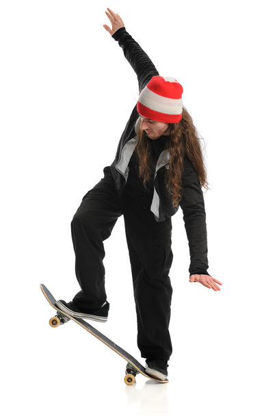 Skateboarder Performing Trick - 写真・画像