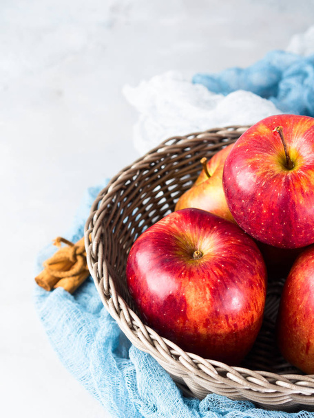 Fresh apples in basket. Healthy eating background - 写真・画像