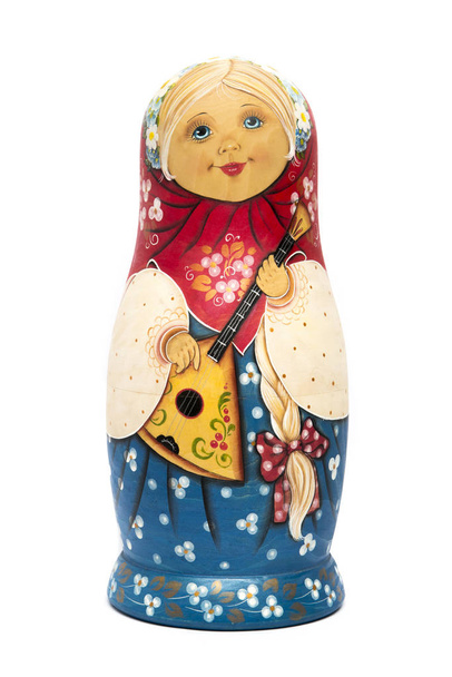 Russian wooden doll matrioshka with balalaika isolated - Photo, Image