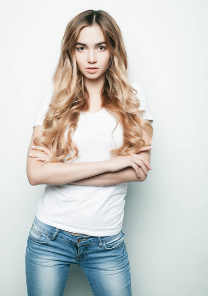 fashion model posing in studio, white background - Фото, зображення