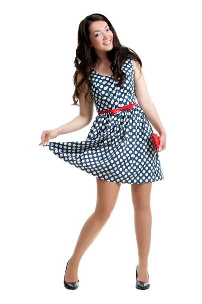 Beautiful young woman in polka dot dress - Foto, Imagen