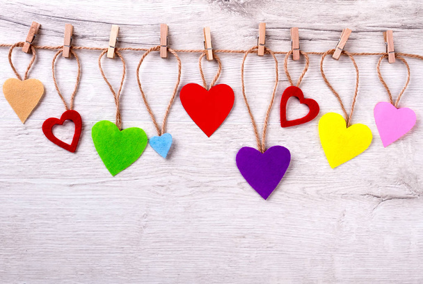 Many colorful hearts on rope. - Foto, Bild
