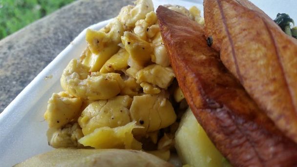 Ackee weegbree en callaloo ontbijt - Foto, afbeelding