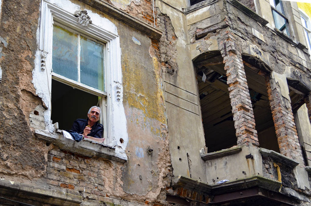 Old buildings and local people in Tarlabasi - Photo, Image