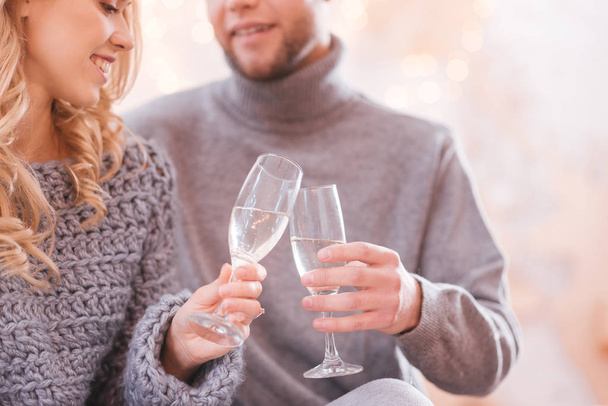 Close up of glasses being filled with champagne - Fotoğraf, Görsel