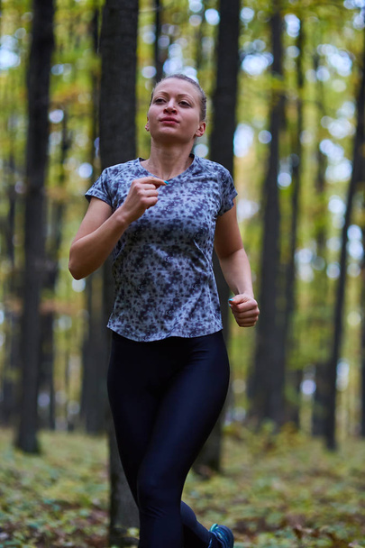 sport woman in forest - Photo, Image