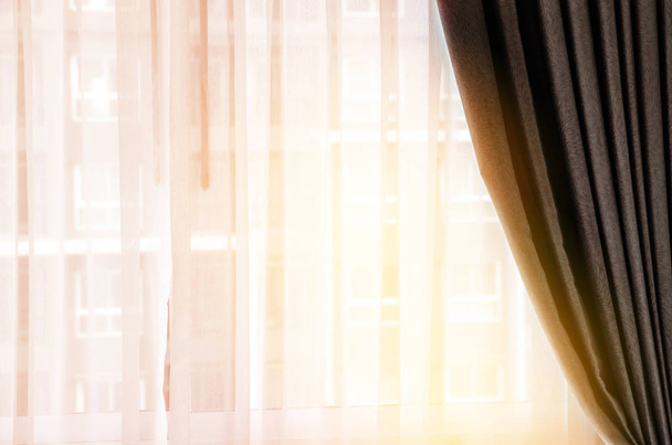 Light shines through white curtains in room - Photo, Image