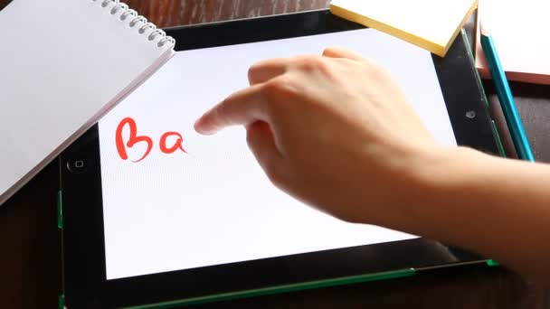 Back to school, hand writes on tablet at workplace - Imágenes, Vídeo