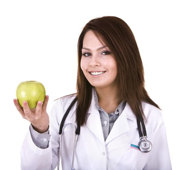 Doctor with stethoscope and apple. - Fotografie, Obrázek