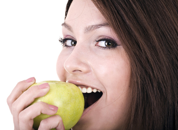 Beautiful young women with green apple. - Photo, Image