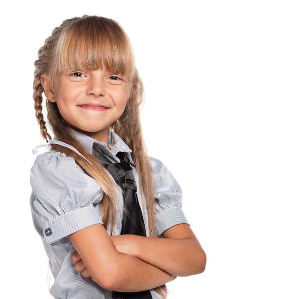 Little girl in school uniform - Фото, изображение