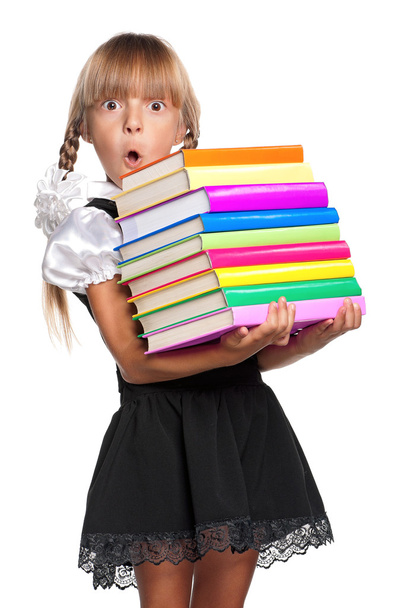 Little girl with books - Фото, зображення