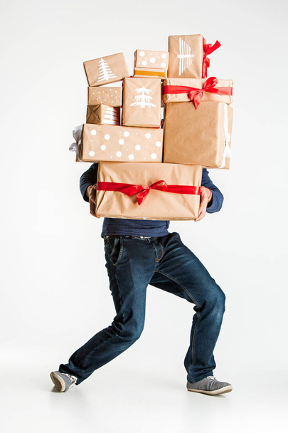 Gift boxes in the hands of young man - Foto, imagen