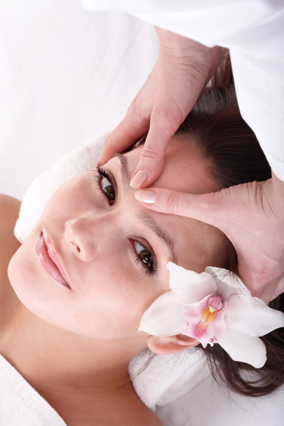 Girl and beautician. Facial massage. - Photo, Image