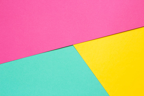 Colored paper in a geometric flat composition. - Foto, Bild