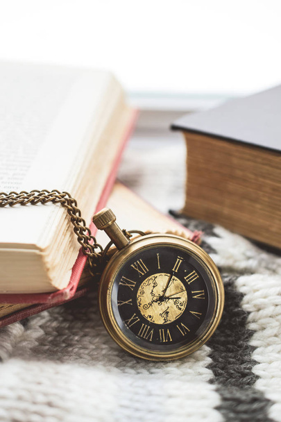 Pocket Watch with Old Books on Scraf in Vintage Tone - Foto, Imagen
