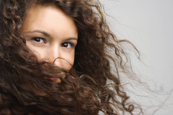 Woman with hair over mouth - Φωτογραφία, εικόνα