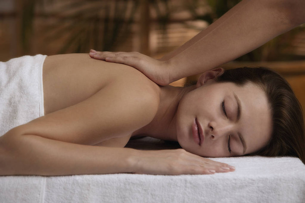 Young woman having massage - Zdjęcie, obraz