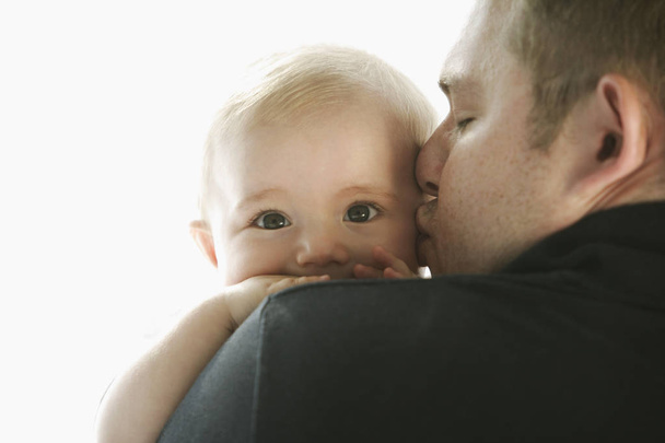 father holding baby  - Фото, изображение