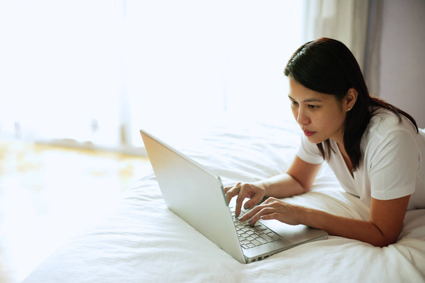 Woman using laptop - Photo, Image