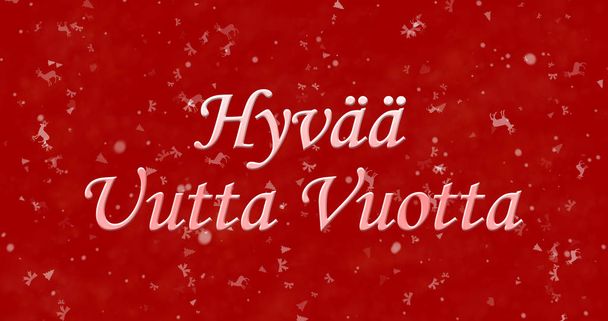 Szczęśliwego nowego roku tekst w języku fińskim "Hyvaa uutta vuotta" na czerwonym tle - Zdjęcie, obraz