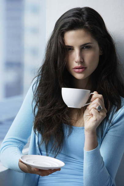 woman with coffee cup  - Фото, изображение