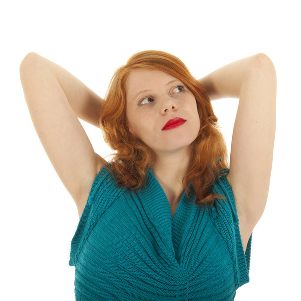 Portrait girl with red hair stretching - Фото, зображення