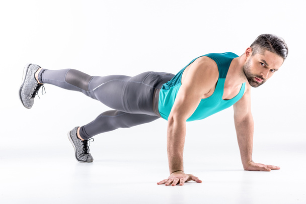 Man doing plank exercise - Foto, afbeelding