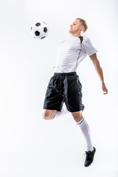 Soccer player exercising with ball - Foto, immagini