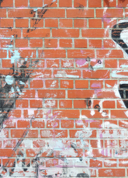 brick wall background with graffitis - Photo, Image