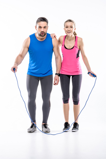 Sportive couple with skipping rope - Photo, Image