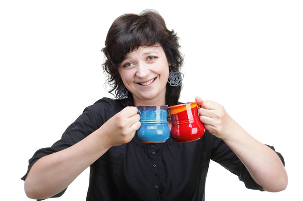 woman holding a red and blue cup, isolated - Photo, Image